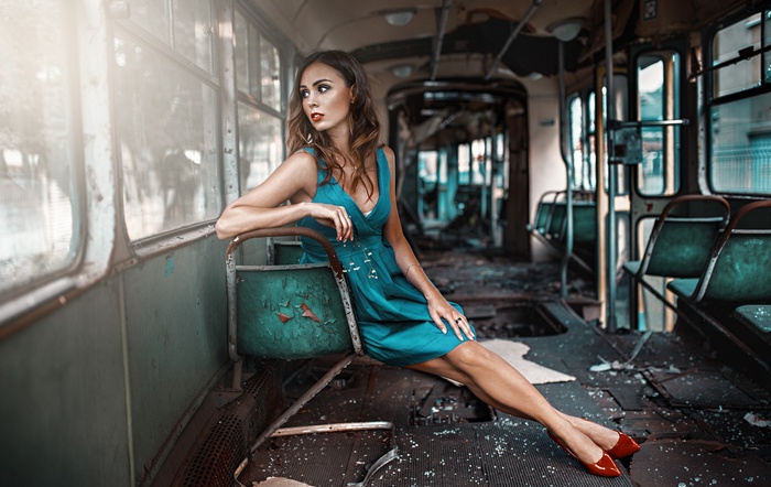 Katarzyna Kluska sitting in a ruined train