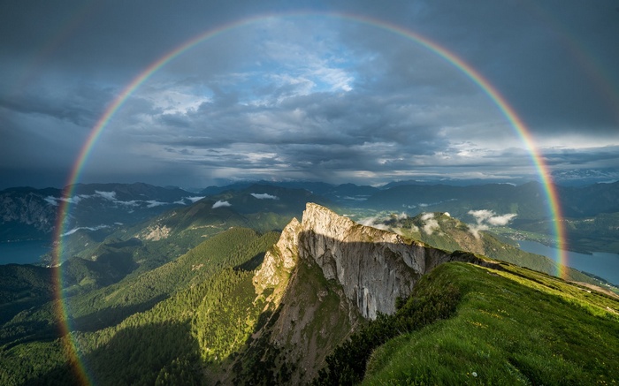 Austria snowy peak mountains Alps sunlight trees landscape forest lake shadow nature rainbows birds eye view clouds grass
