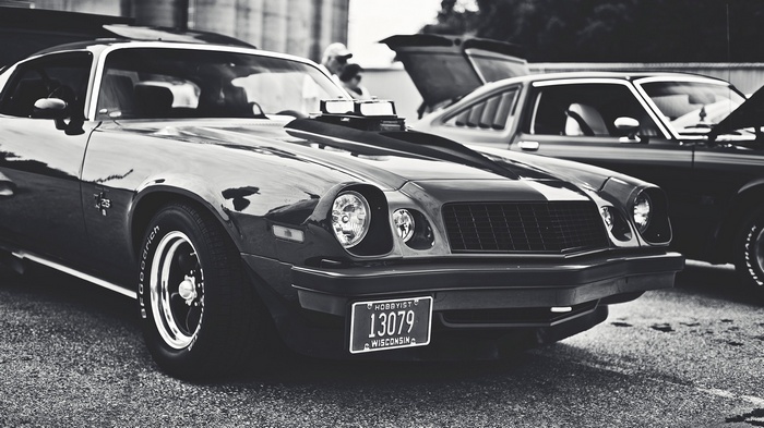 Monochrome Chevrolet Camaro Z28 with custom hood scoop