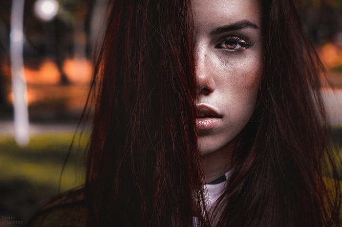 Woman with red hair and freckles