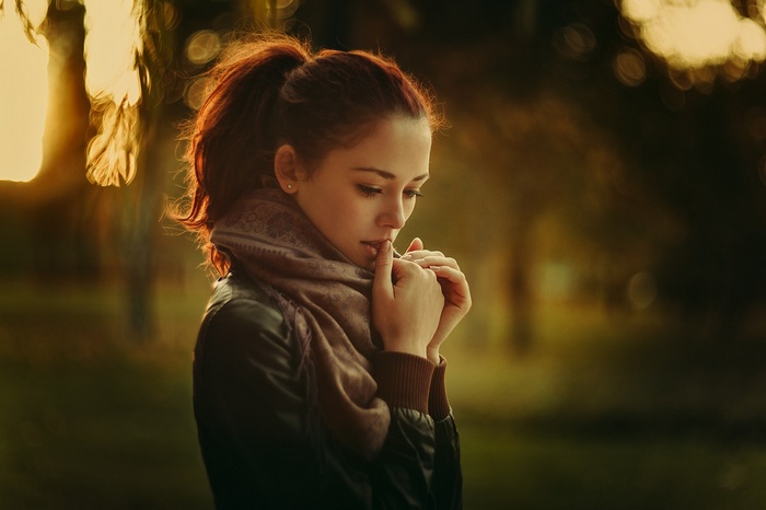 Woman with ponytail and scarf in sunlight