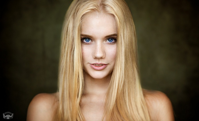 Portrait of a blonde woman with blue eyes