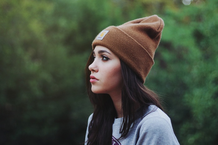 Woman wearing a Carhartt beanie outdoors