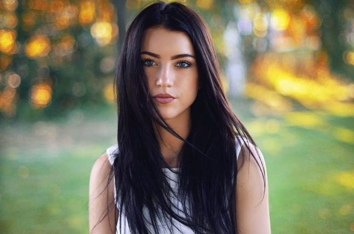 Portrait of Patrycja Rojecka with black hair and blue eyes