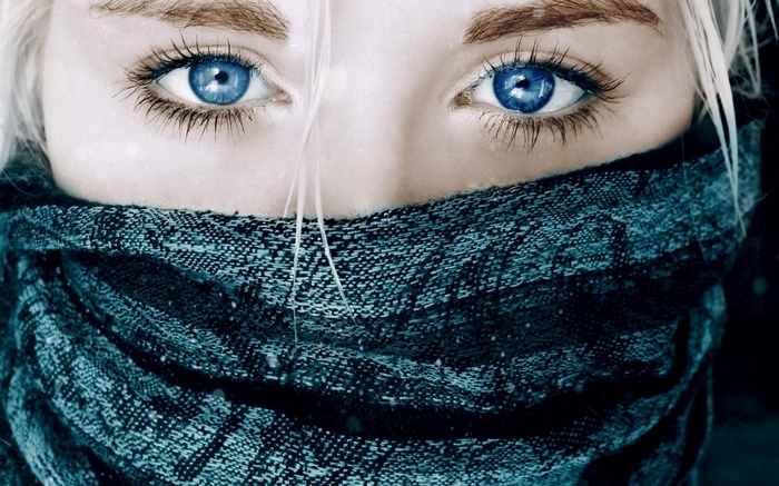 Woman with blue eyes and scarf