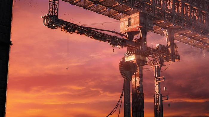 Industrial bridge structure against a sunset sky