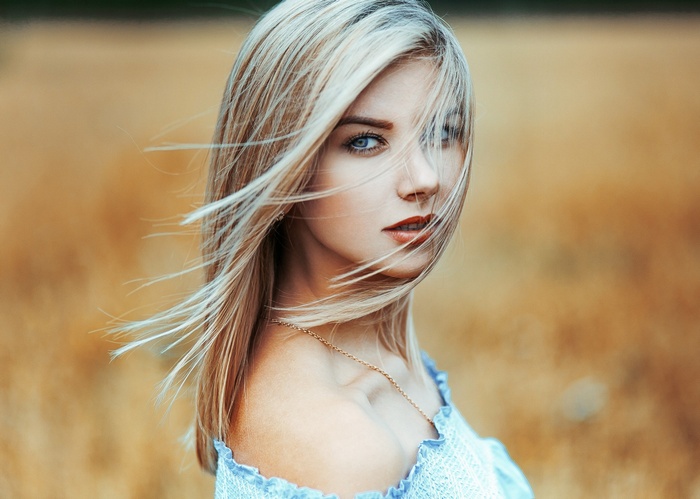 Portrait of a blonde woman with blue eyes