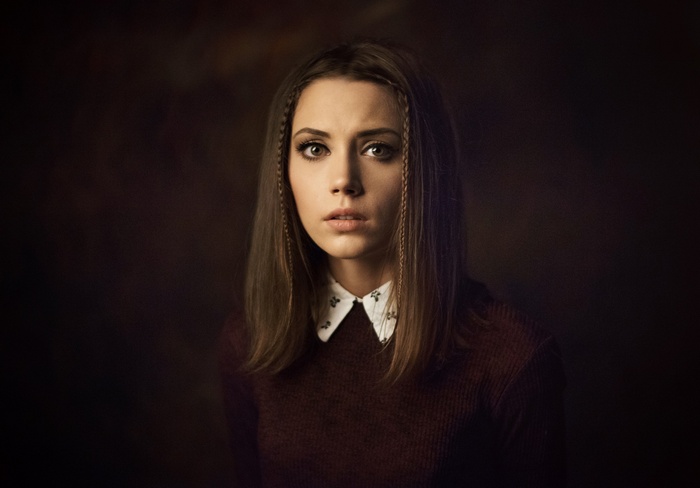 Portrait of a woman with braided hair