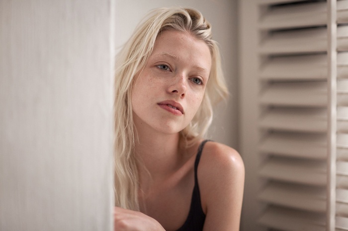 Ruby James with blonde hair and freckles
