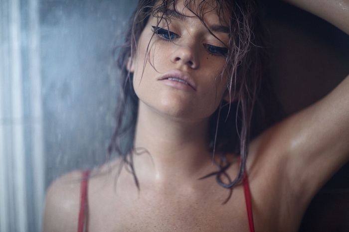 Ruby James with wet hair and blue eyes