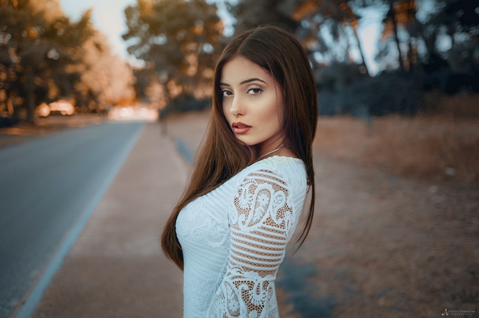 Portrait of a woman with brown eyes by Agelos Tzitzifopoulos