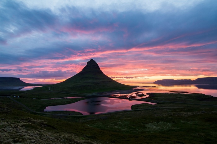 Kirkjufell mountain in Iceland during sunset