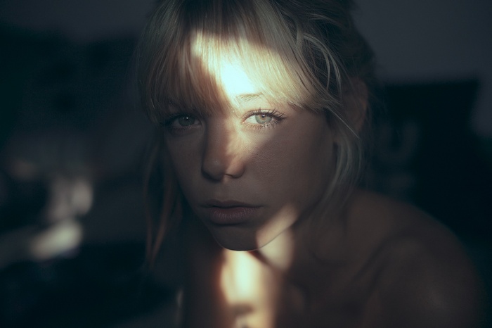 Woman with sunlight on her face