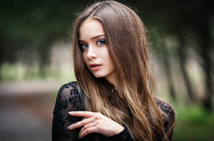 Portrait of a young woman by Denis Petrov