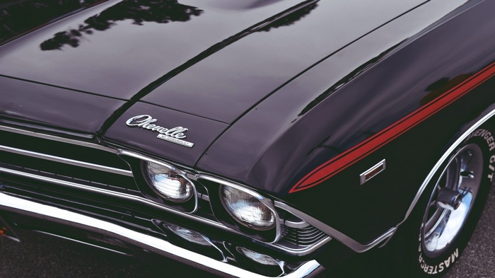 Black Chevrolet Chevelle with red stripes