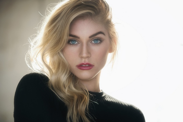 Portrait of Allie with blonde hair and blue eyes