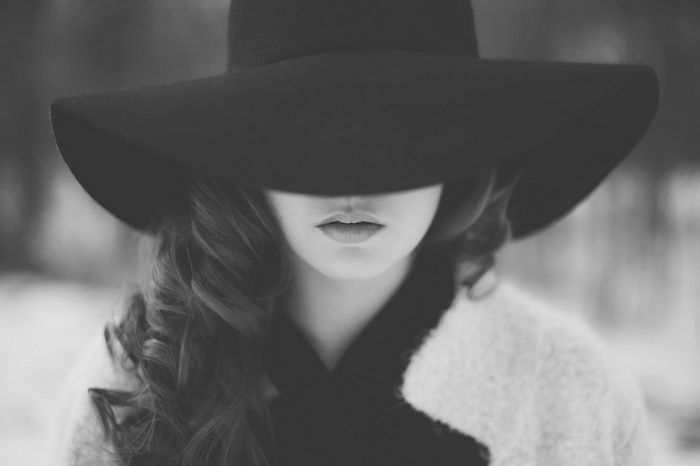 Woman in a wide-brimmed hat