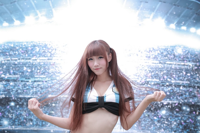 Ji Xin Qiao in a stadium outfit