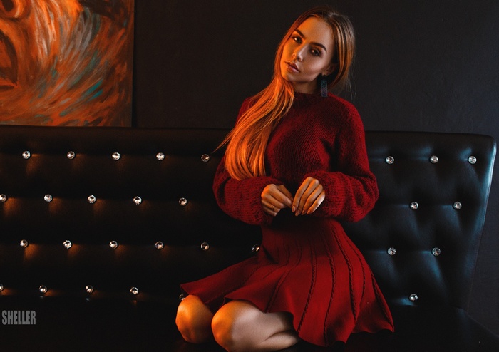 Anastasia Pliaskina on a couch