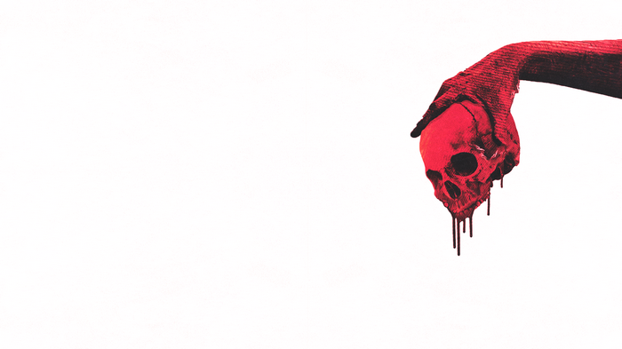Red hand holding a bloody skull