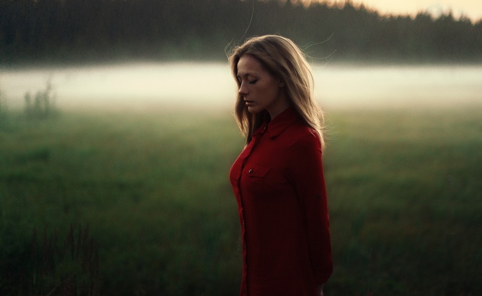 Olga Kobzar in a red shirt in the mist