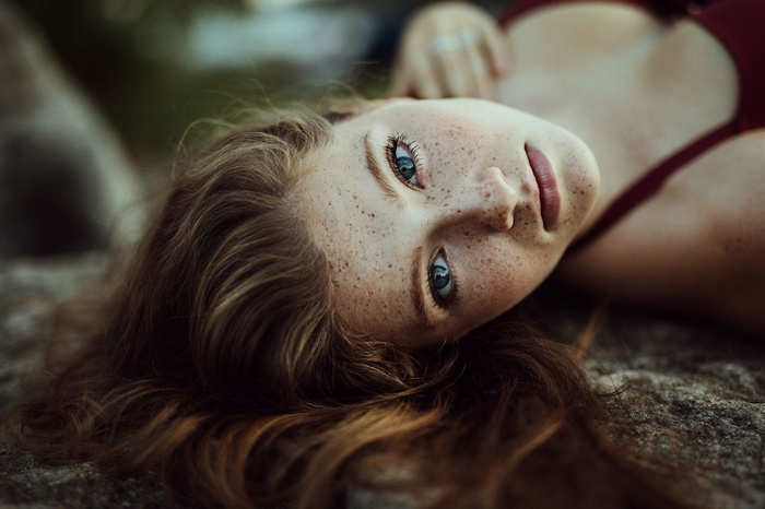 Jesse Herzog with freckles and blue eyes
