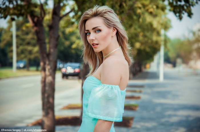 Woman in a blue dress by Sergey Efremov