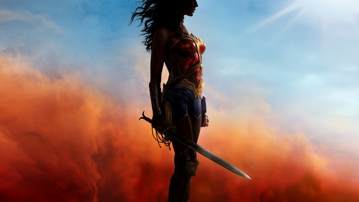 Wonder Woman with Sword Against Fiery Sky