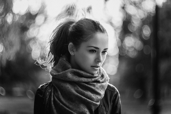 Monochrome portrait of a woman with a scarf