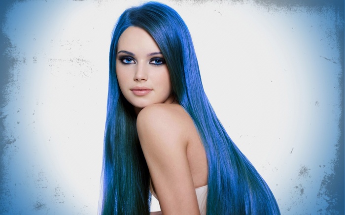 Woman with long, vibrant blue dyed hair