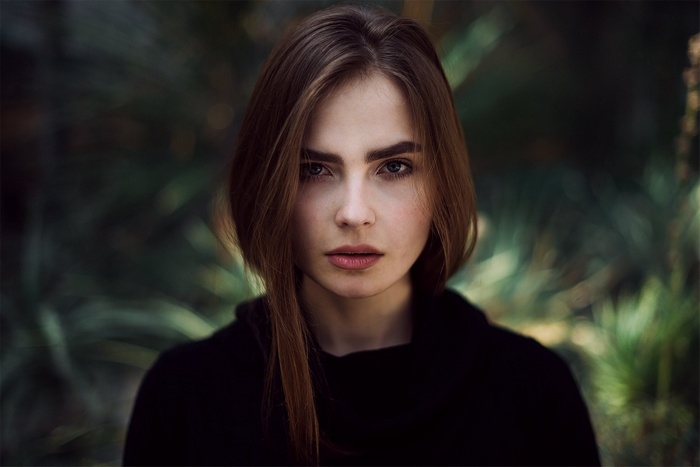 Portrait of a young woman with brown hair