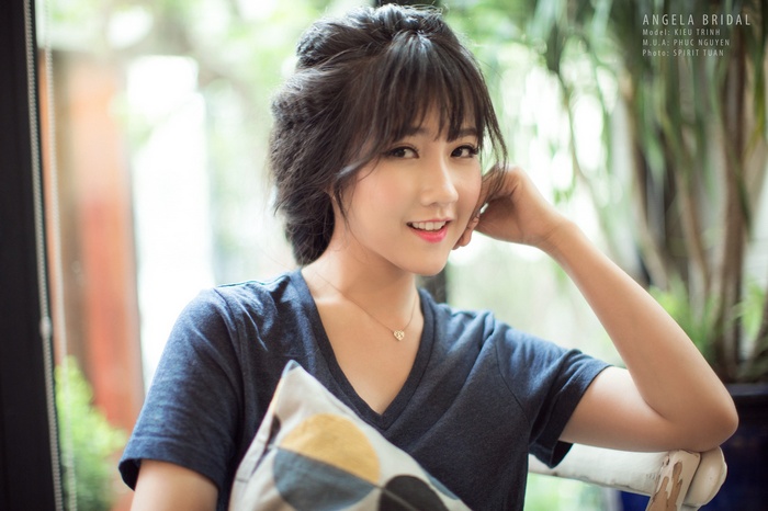 Portrait of a young Asian woman named Kieu Trinh