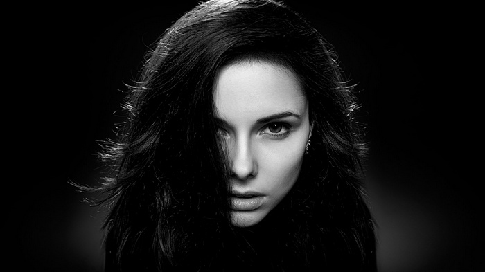 Monochrome portrait of a woman with dark hair