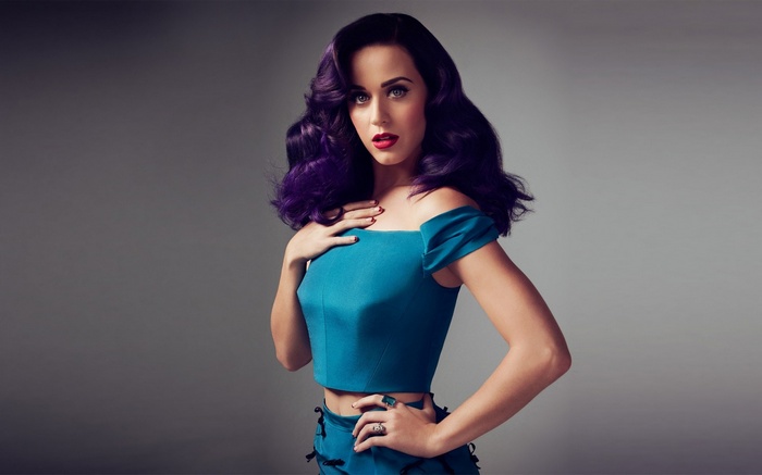 Katy Perry with purple hair and blue top