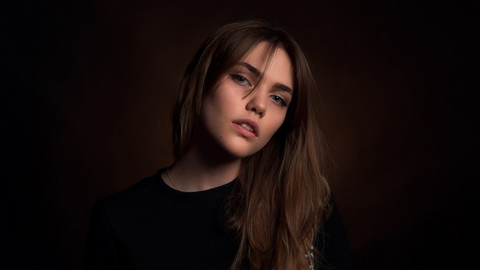 Portrait of a young woman with brown hair