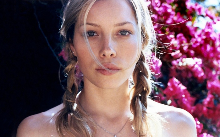Jessica Biel with pigtails and pink flowers