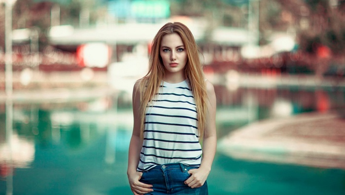Woman with long blonde hair outdoors