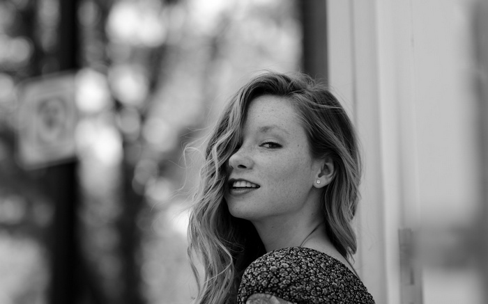 Hattie Watson with freckles and long hair