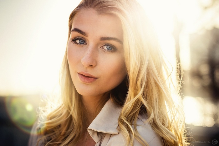 Portrait of a blonde woman with blue eyes