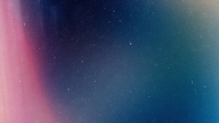 Abstract blue and pink gradient with film grain