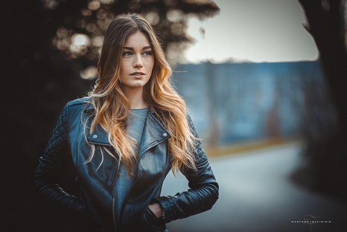 Woman in leather jacket by Manthos Tsakiridis