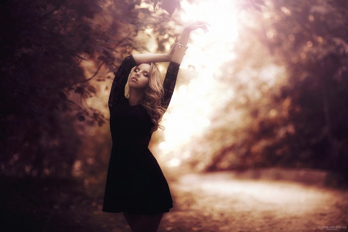 Woman in black dress by Karen Abramyan