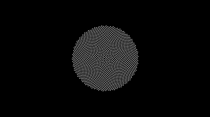 Abstract spiral pattern of white dots on black