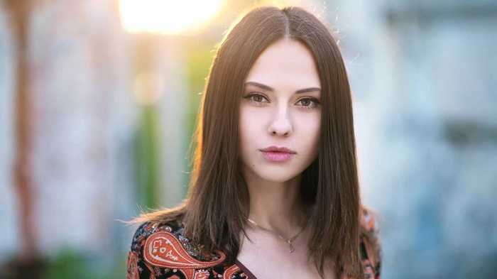 Young woman with long brown hair