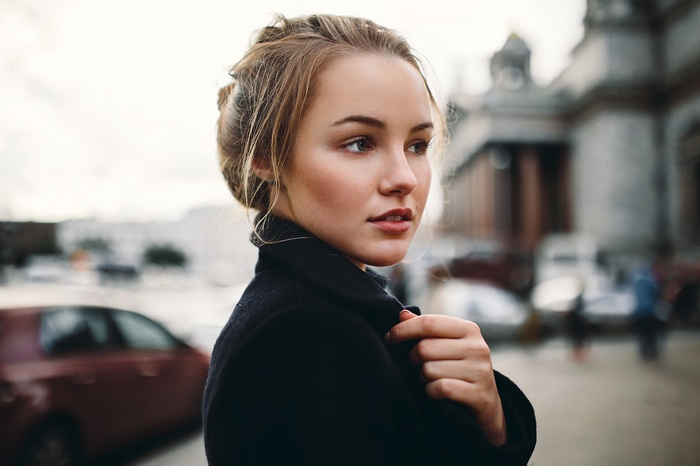 Julia Tavrina in a black coat