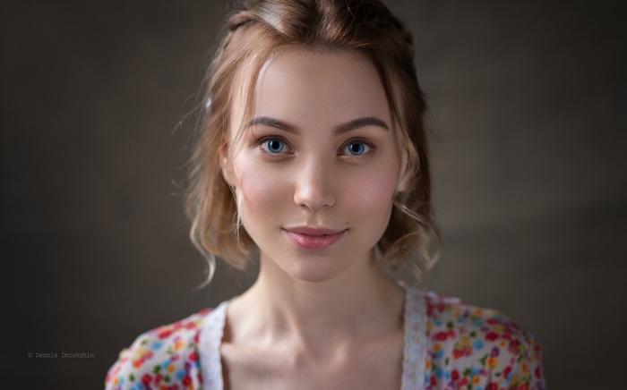 Portrait of a young woman by Dennis Drozhzhin