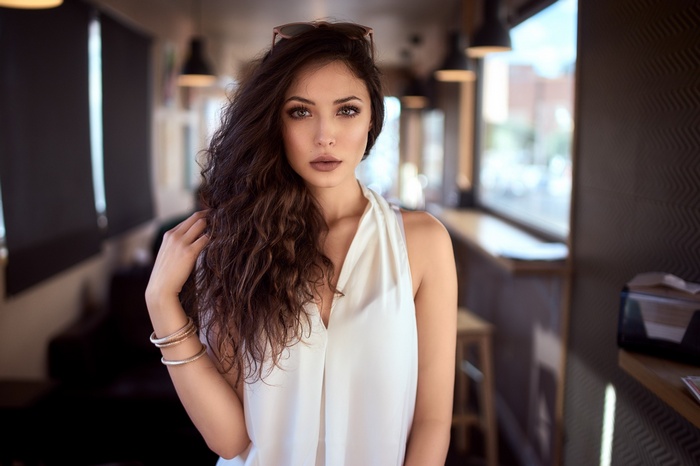 Savannah Cornejo with wavy hair and sunglasses