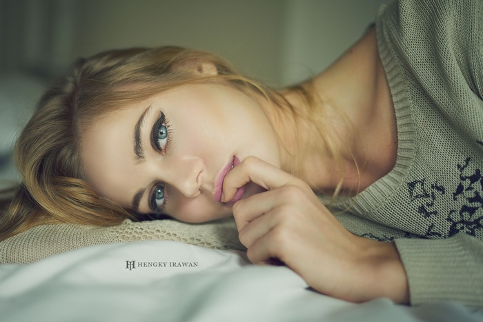Portrait of a blonde woman with blue eyes by Hengky Irawan