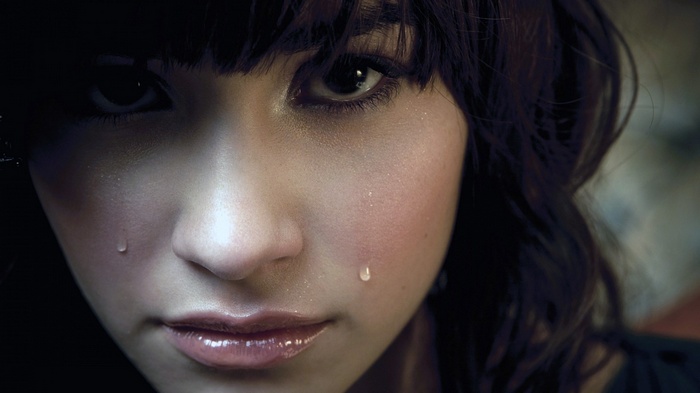 Close-up of a woman crying