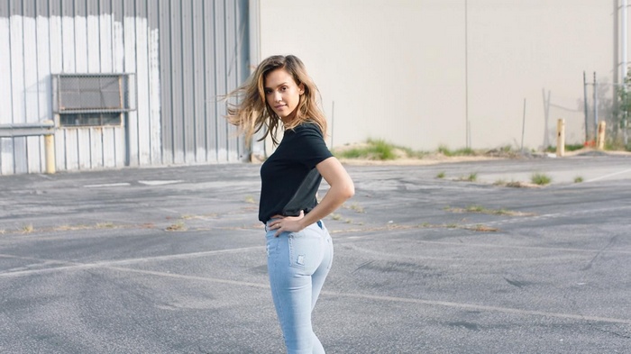 Jessica Alba in a black t-shirt and jeans